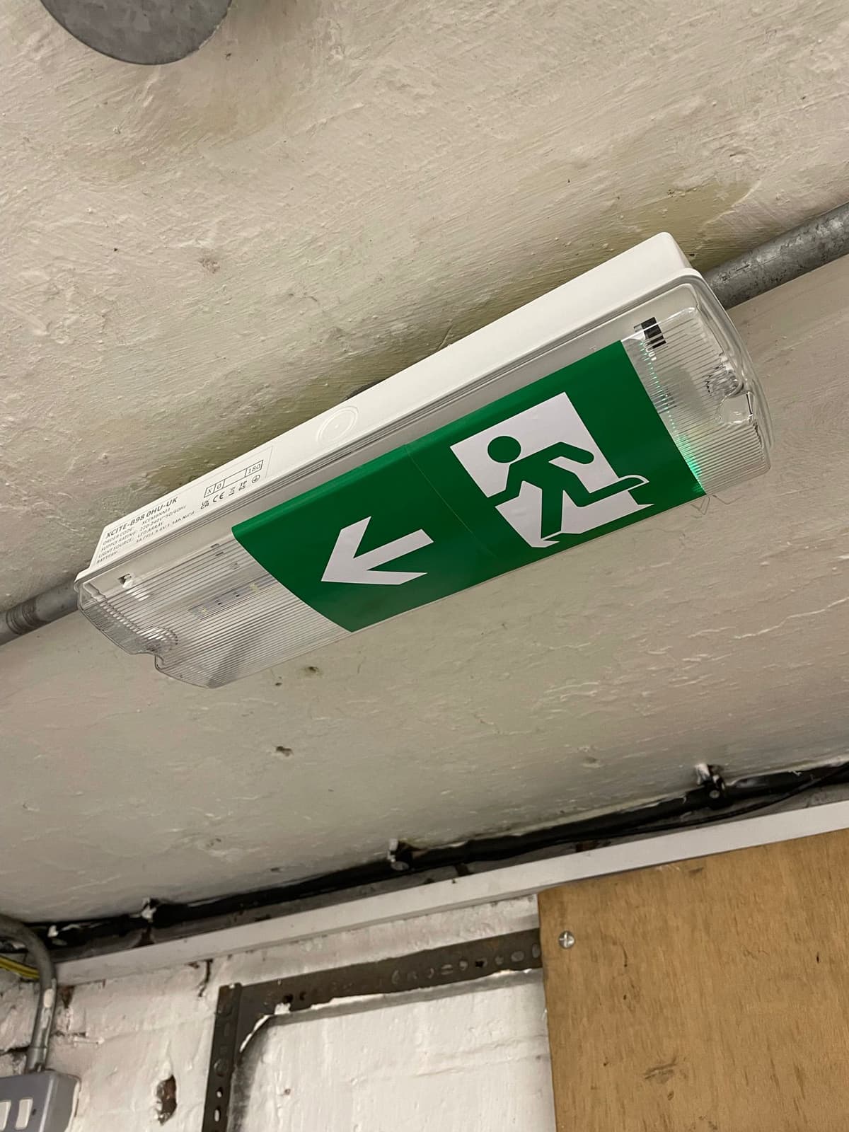 Emergency lighting being fitted by Siren Fire & Security